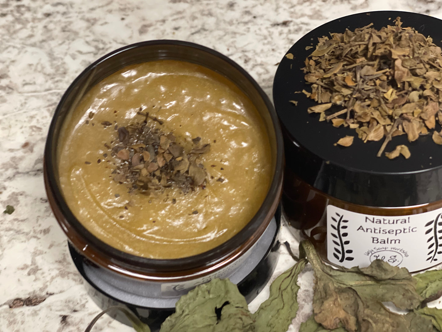 Chaparral, Plantain, Jojoba and Almond oil Salve